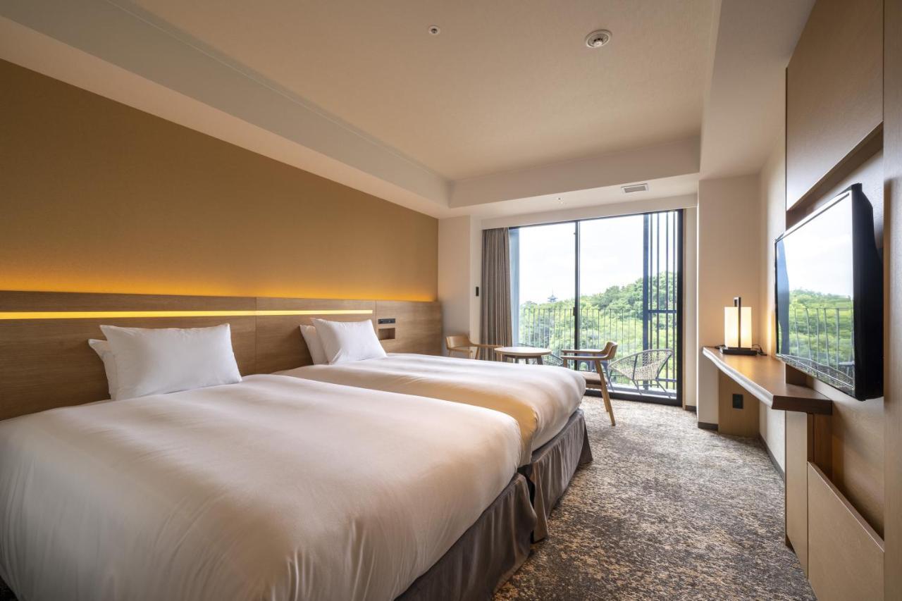 酒店 Umekoji Potel 4*